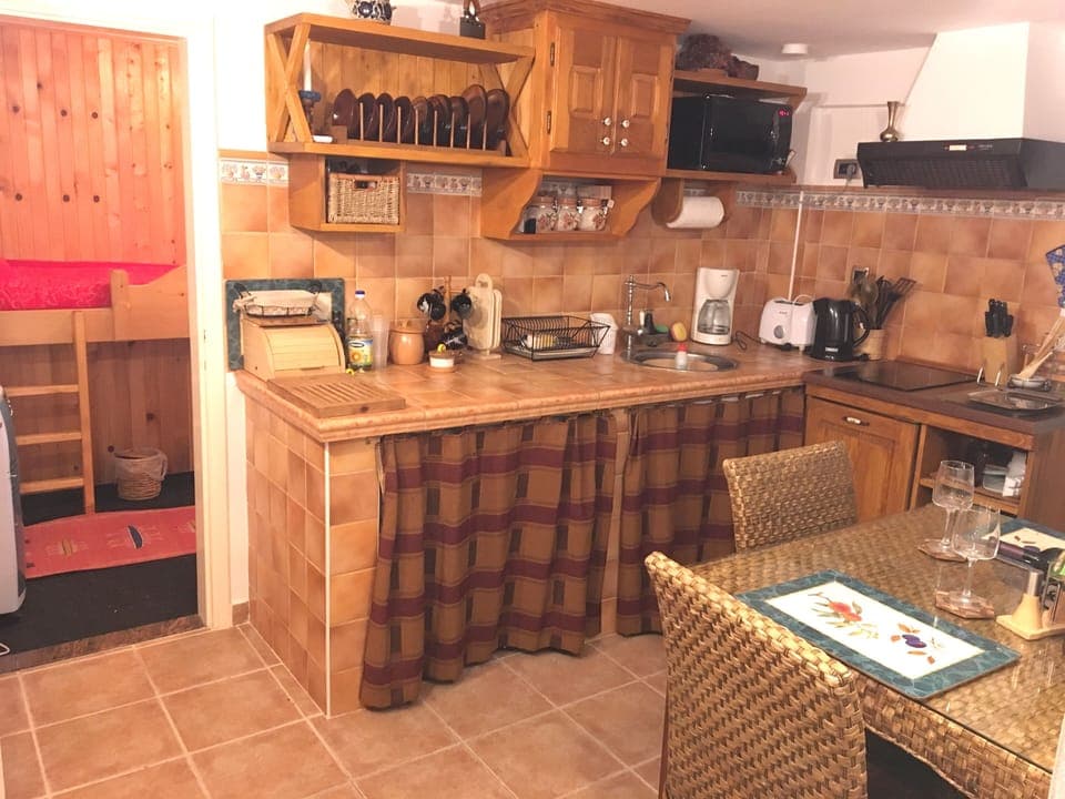 Kitchen with view of the second bedroom