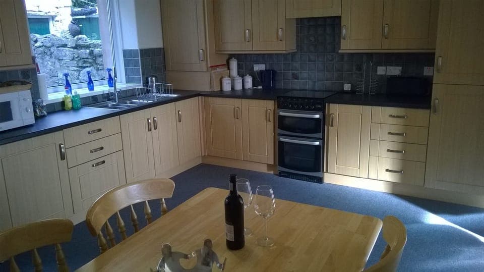 Kitchen with table and four chairs