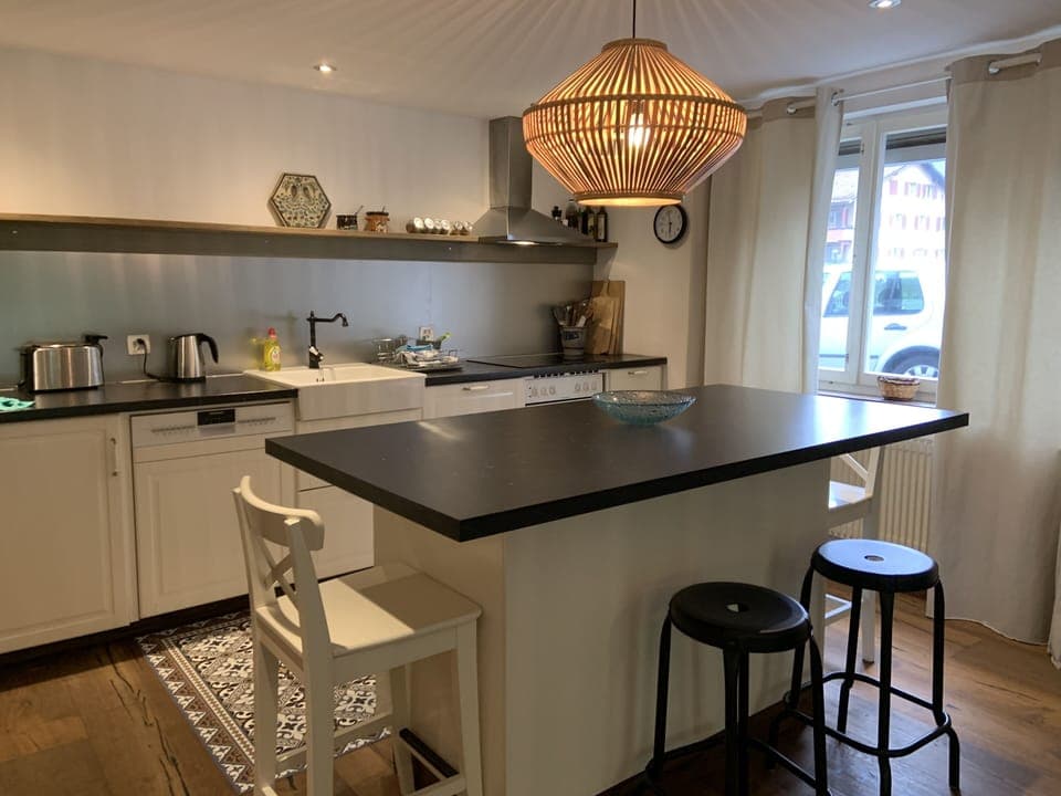 Dining area in open plan kitchen and living area.