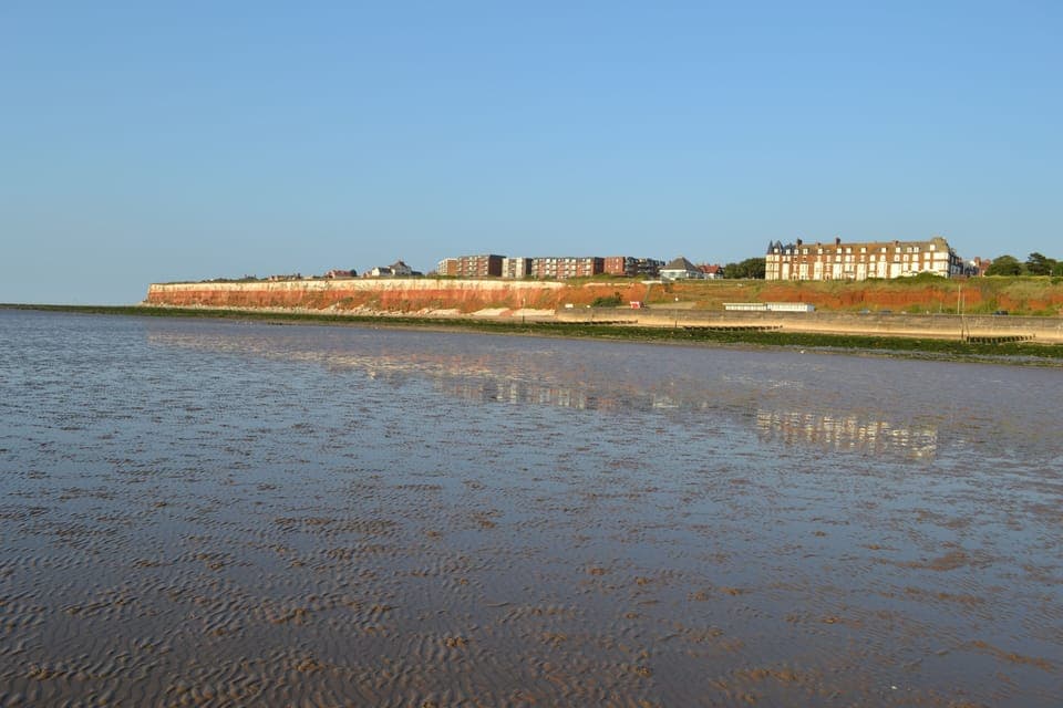 Low tide at Hunstanton looking towards the striped cliffs.