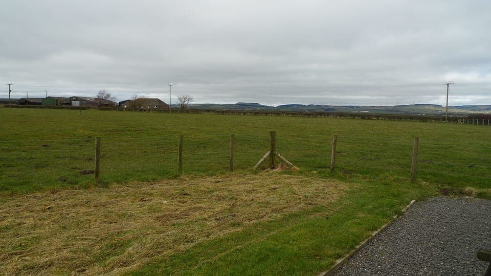 Rear of cottage.  There is a farm just out of sight on the left.