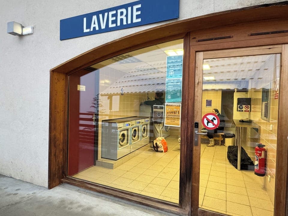 Local launderette which accepts card and has a detergent dispenser.