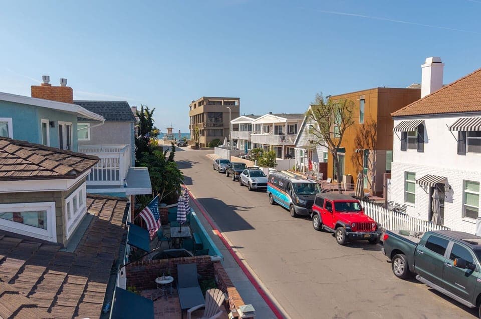 Follow this iconic Newport Beach street straight to the sand, your effortless path to ocean breezes, golden shoreline, and classic SoCal beach days
                