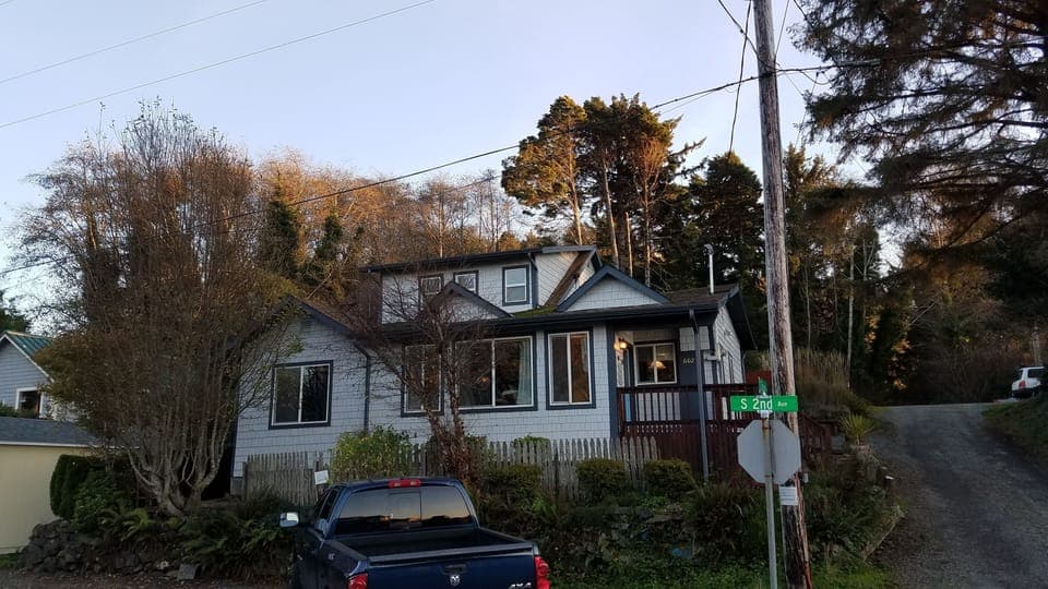 The house from the street. Main parking is in front.