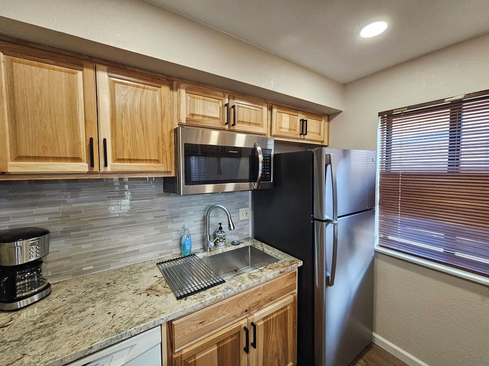 Brand new cabinets, appliances, granite countertops