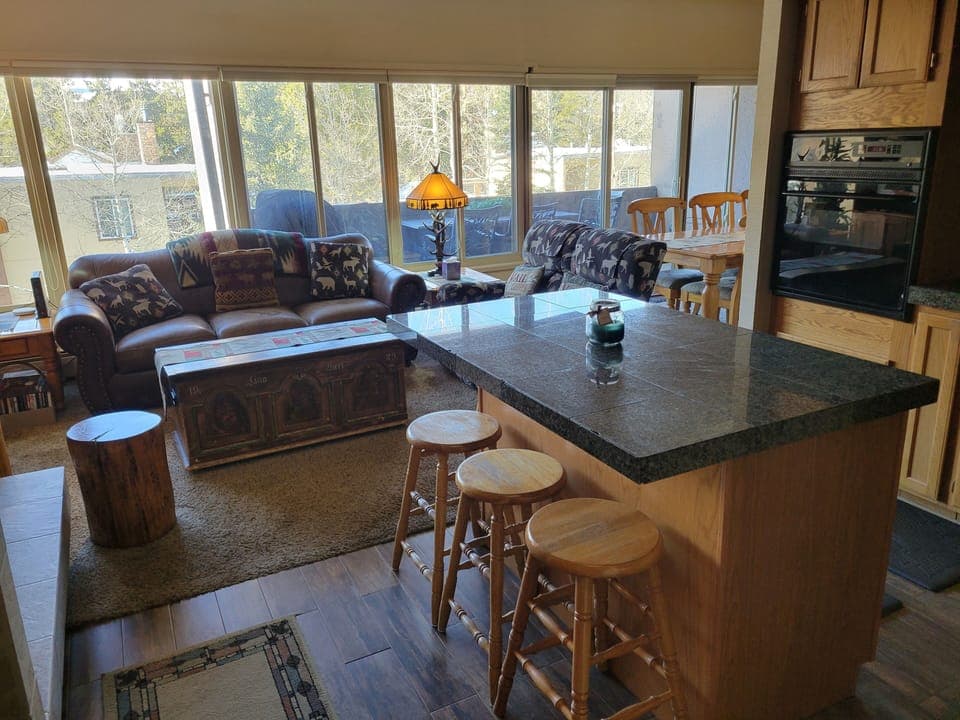 View from kitchen into living room and mountains beyond!