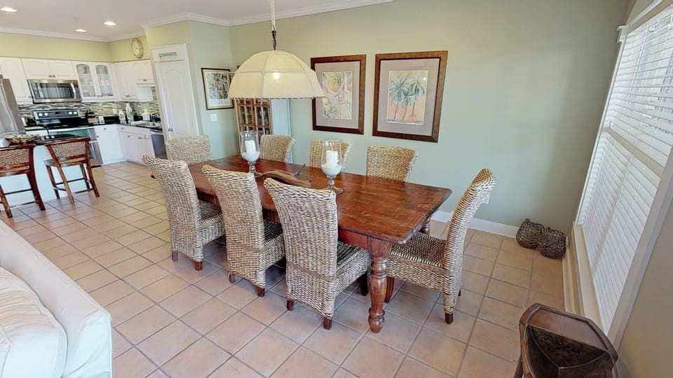 Dining table for 8, plus 2 barstools at the island. 