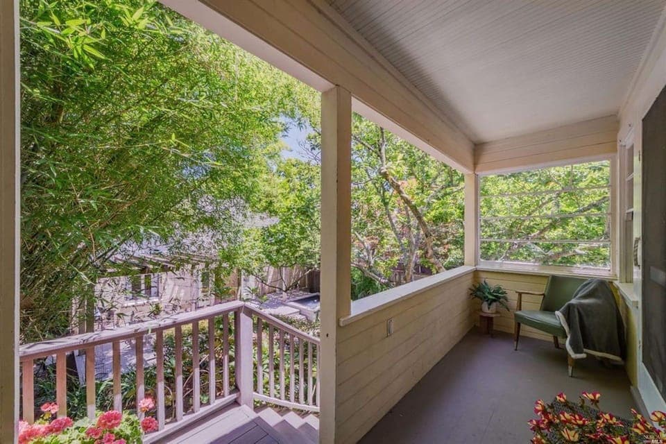 Entry from stairs and front porch