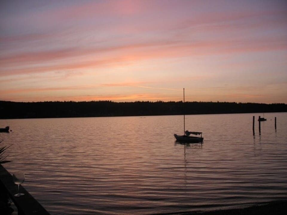 Sunset at the Beach house, enjoy while entertaining or resting in a hammock.