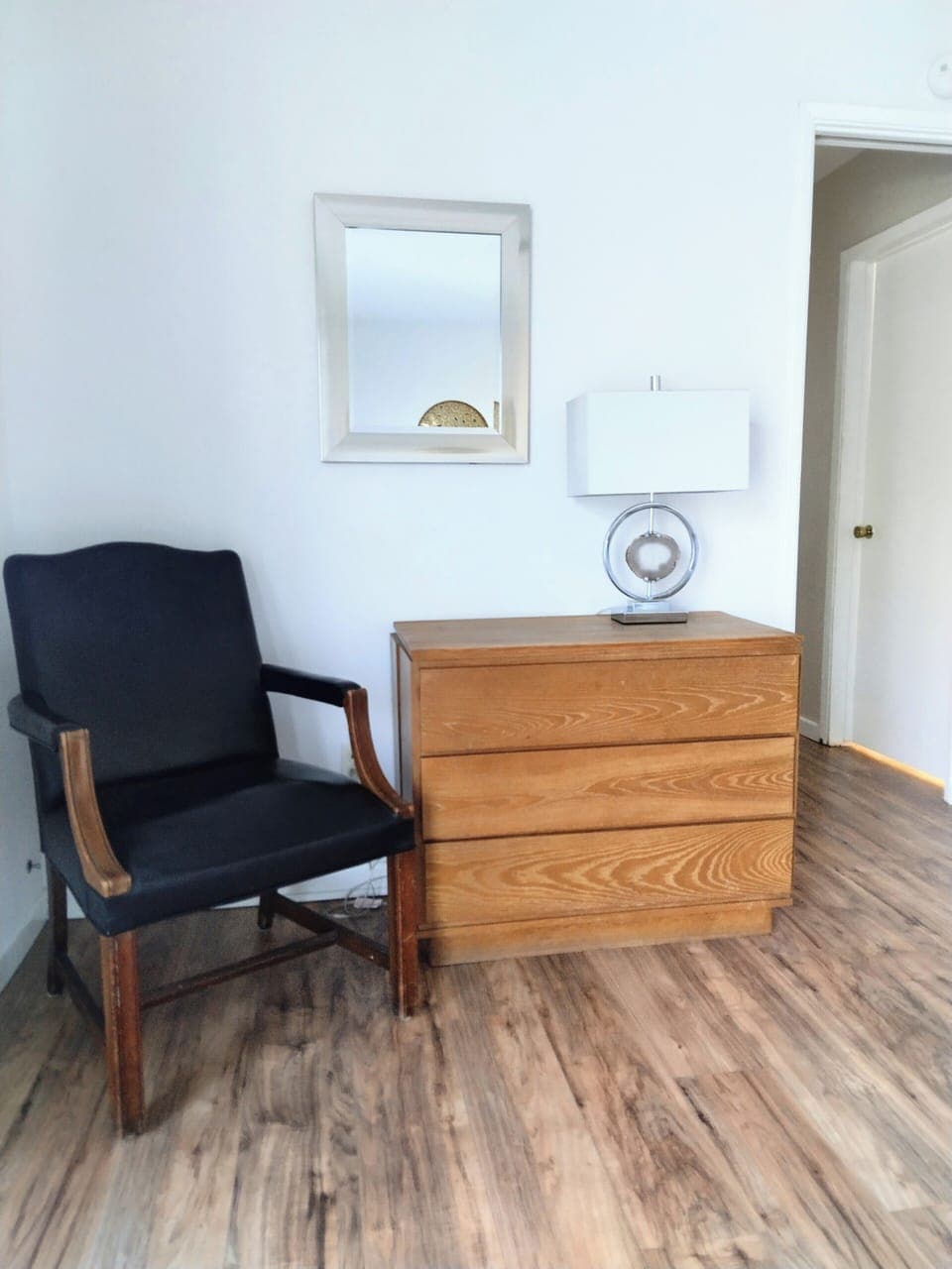 Primary dresser and sitting chair.