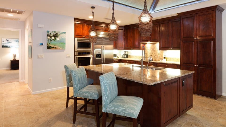 Large island in gourmet kitchen. Stocked with everything for your BBQ, baking and cooking needs.