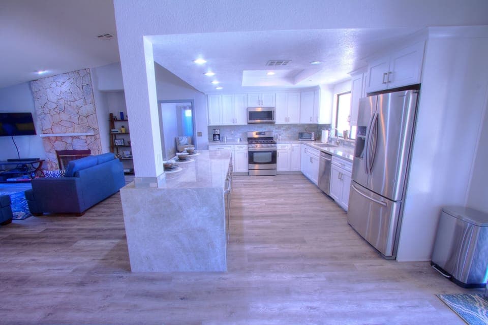 Fully stocked kitchen with cooking utensils