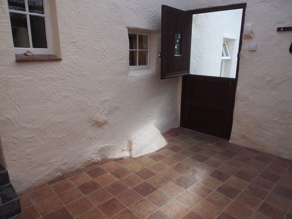 Useful utility room adjoining shower.  Great for bikes and outdoor things