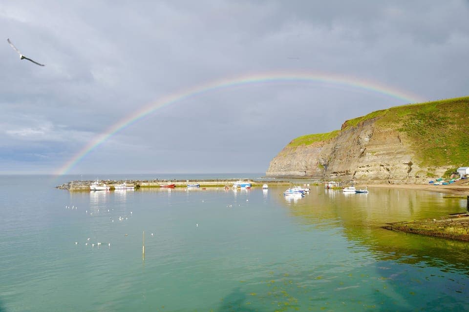Rainbow from cottage cabin
