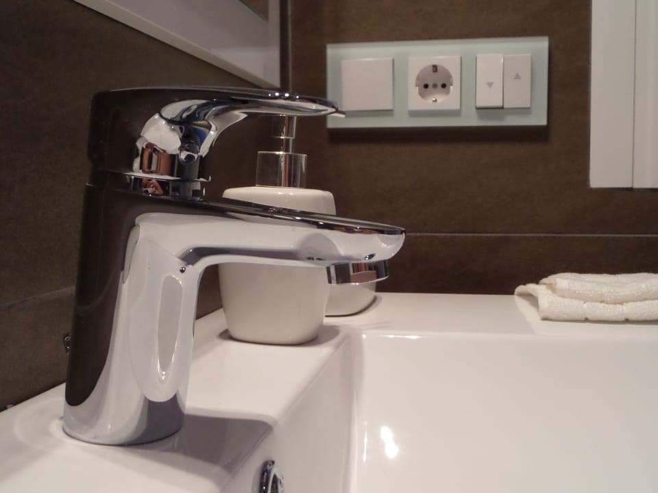 Modern bathrooms superbly appointed.