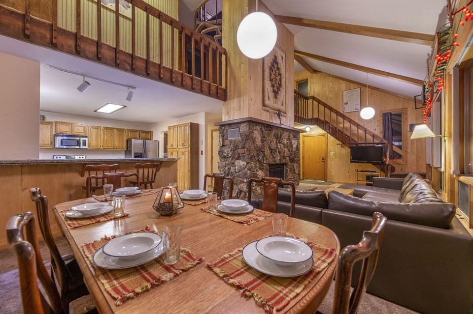 Dining Room showing main staircase to second floor behind