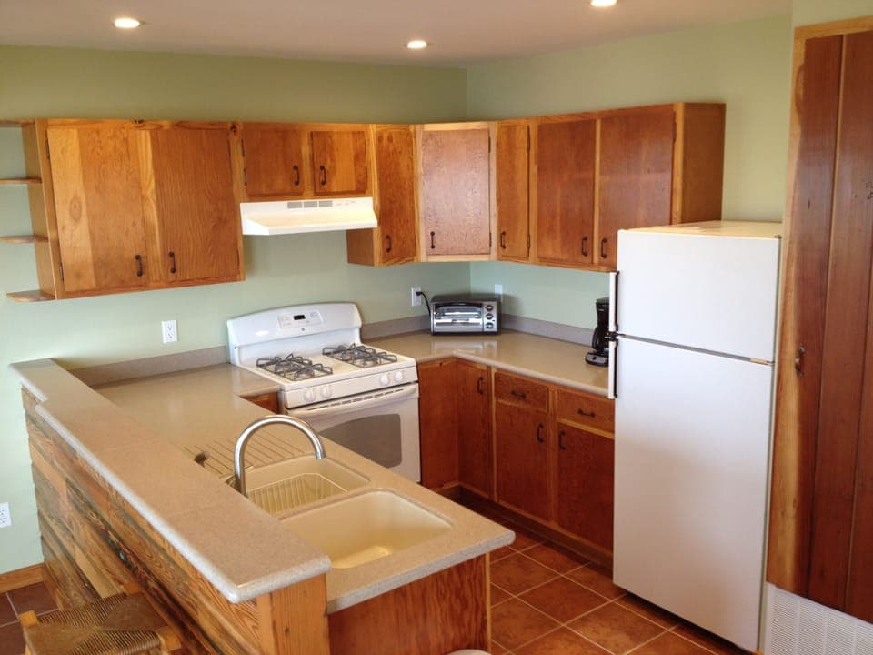 Spacious kitchen for preparing a quick meal or an elaborate feast.