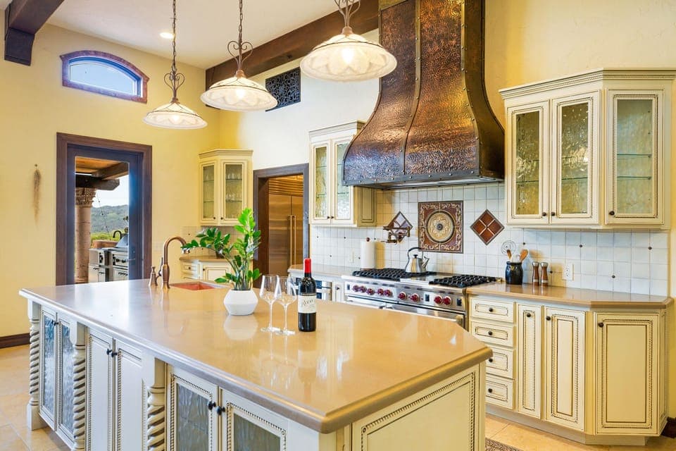 Kitchen with Viking stove, sink, cooking equipment