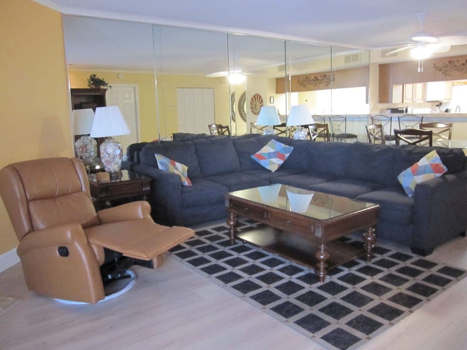Living room with new recliner chair and new flooring.