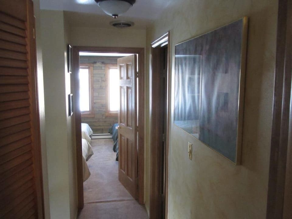 2014 Upstairs Hall to the 3rd Bedroom. Bathroom door is on the right