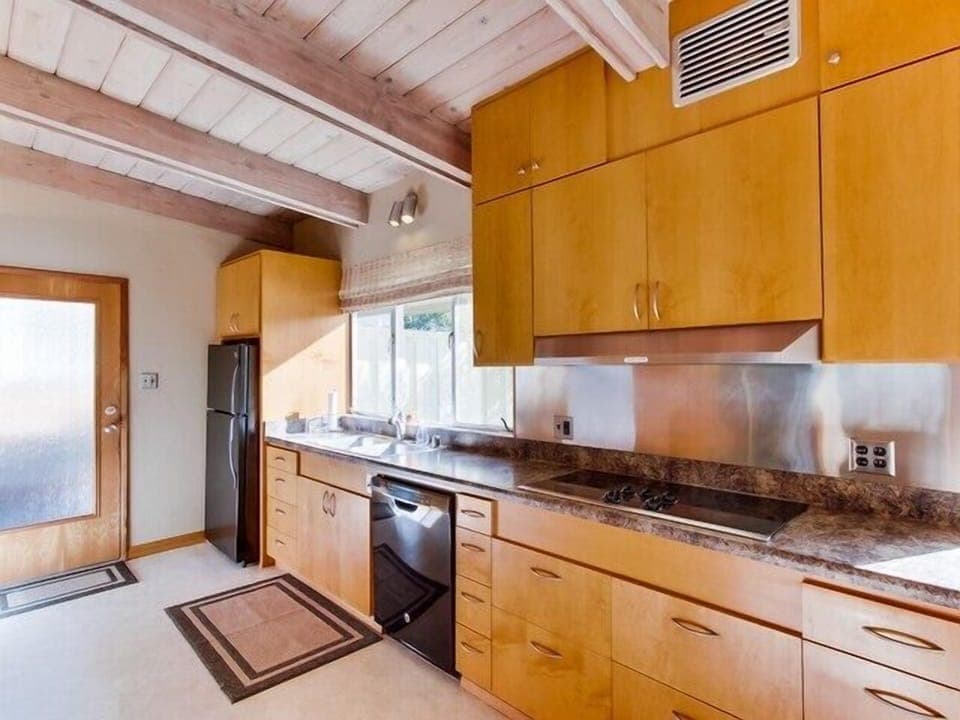 Fully equipped kitchen complete with dishwasher.