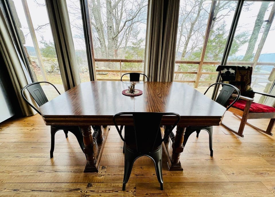 Dining area  -  Surrounded by a wall of windows to enjoy more of the views!