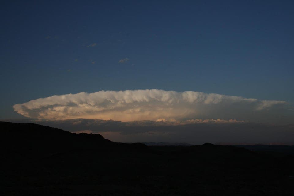 "there's a storm across the valley, clouds are rolling  in"...john denver