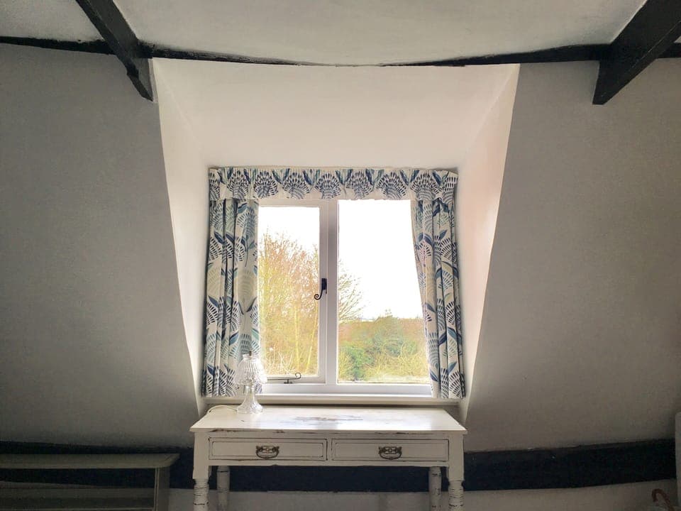 desk in master bedroom through to view 