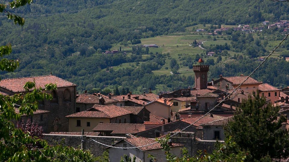 View to Castiglione village rooftops and tower