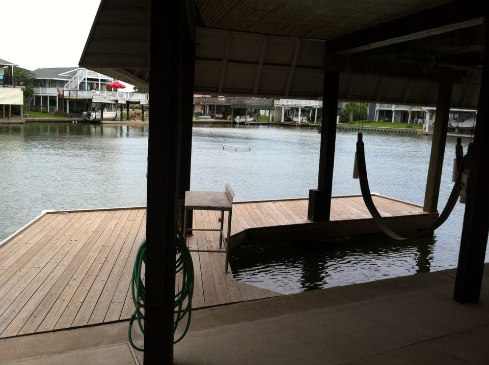 Newly installed larger dock for fishing and fish cleaning table.