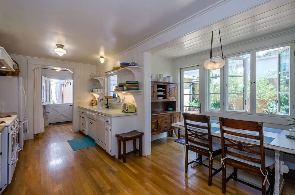 Open kitchen with large farmhouse dining table