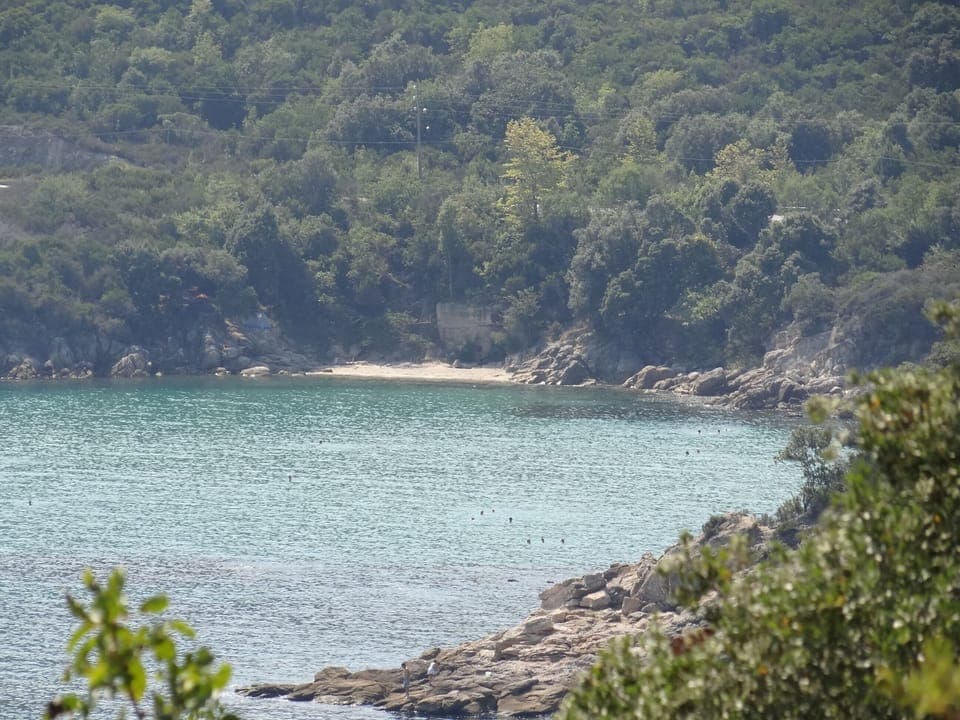Small hidden beach right after Proti Ammoudia Beach, easy access from main road