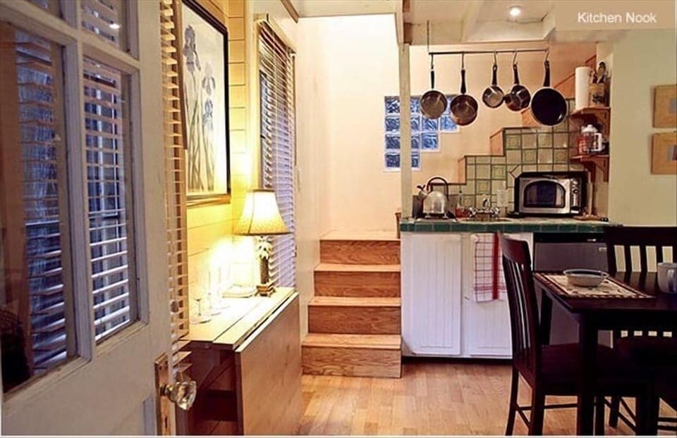 The kitchen in the Gingerbread cottage features a high speed gas cooktop.