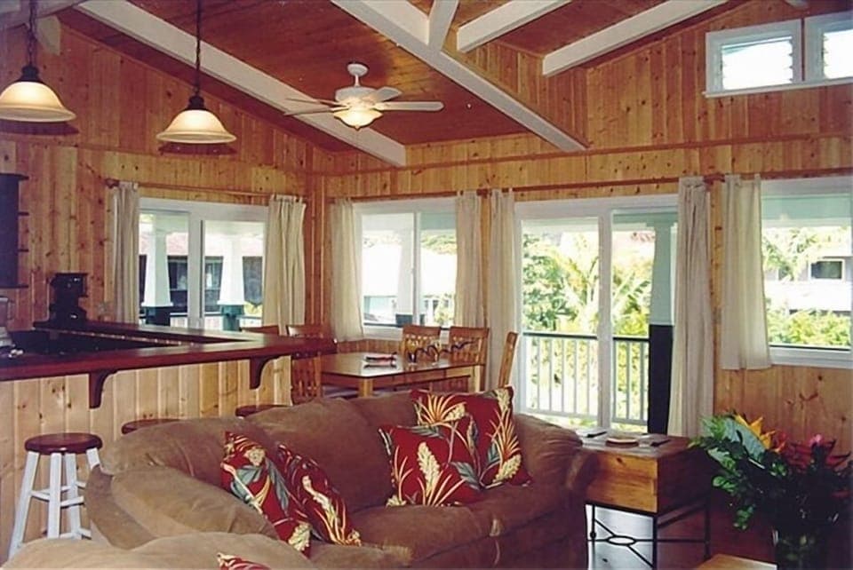 Large living room with open kitchen cozy couches great views