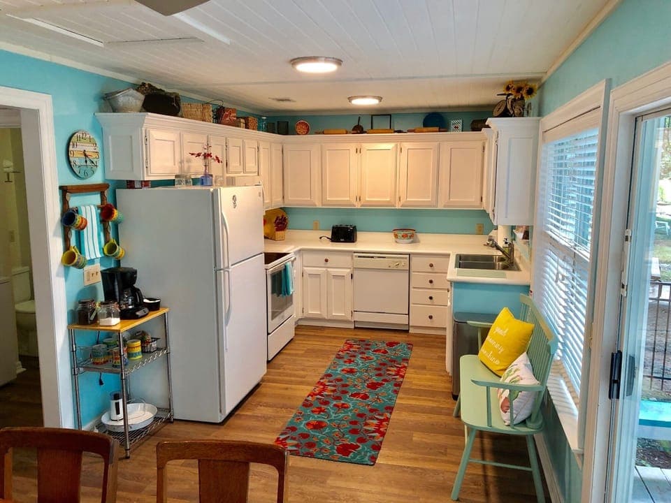 This great kitchen has it all from meal prep to morning coffee or evening wine  