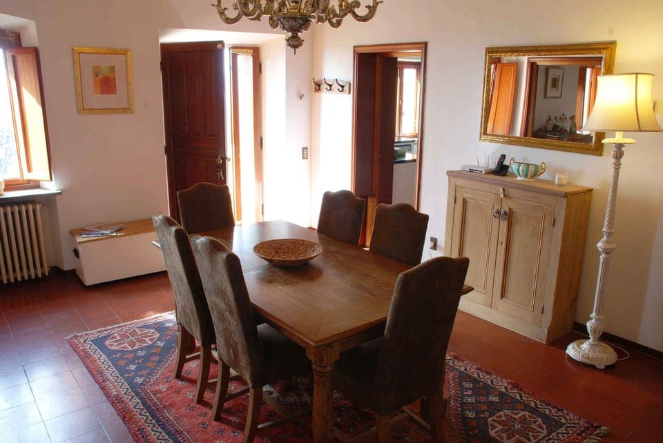 Dining area with extendable table seating 8