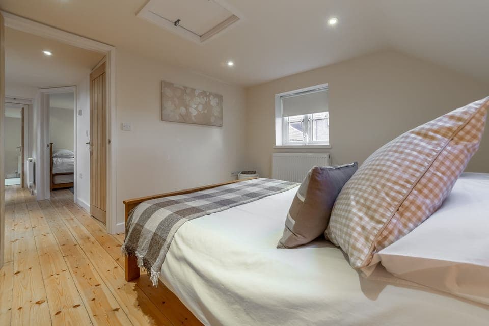 First floor: Bedroom two with double bed