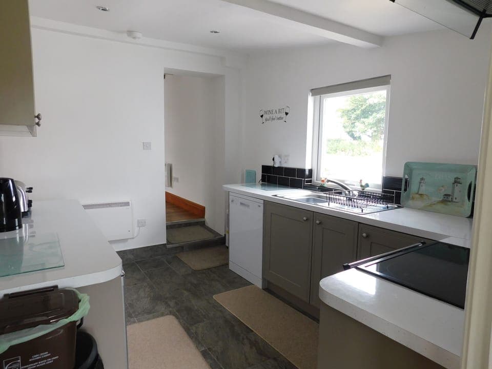 Seperate Kitchen with undercounter fridge and freezer.