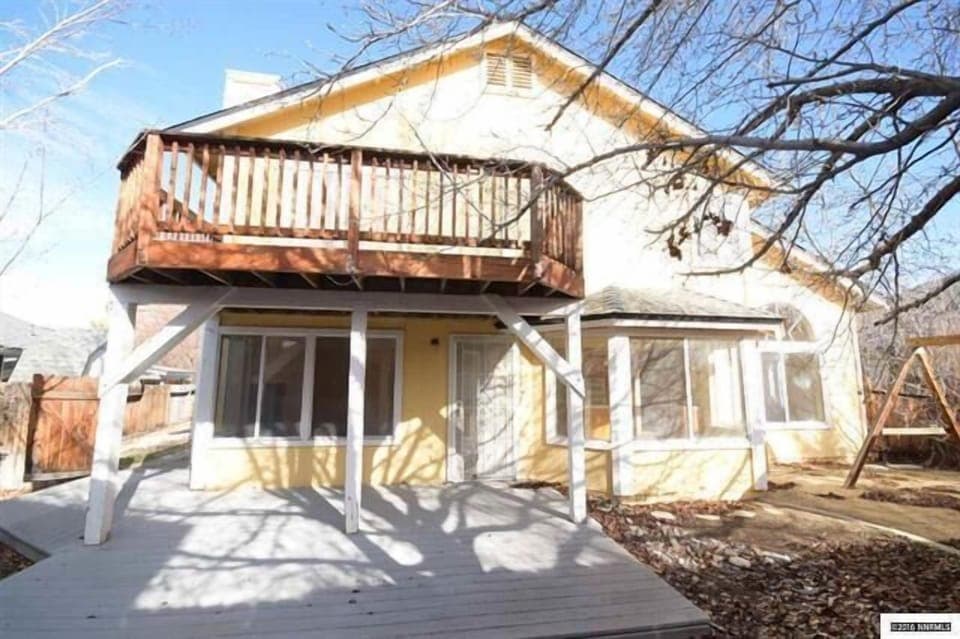 PRIVATE FENCED BACK YARD WITH GARDEN DECK AND GAS BARBECUE GRILL