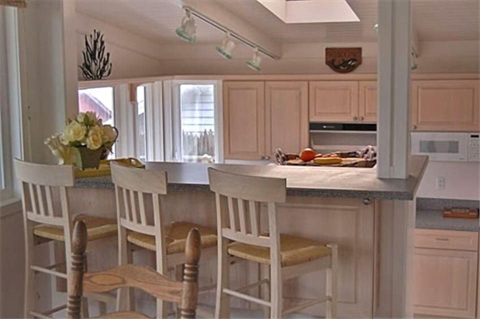 Counter Seating near Kitchen and Dining Area 