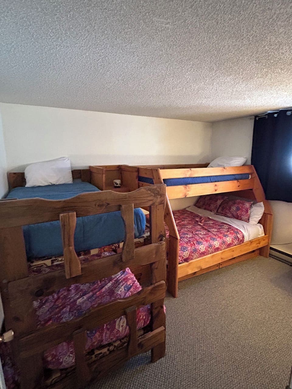 2 bunk beds in second bedroom.  One lower bunk has full size bed.