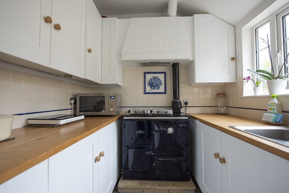 Kitchen - with Rayburn (mini Aga), microwave, induction hob, Quooker tap