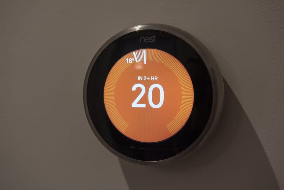 The NEST thermostat - so you're always cosy - dial it clockwise for more heat