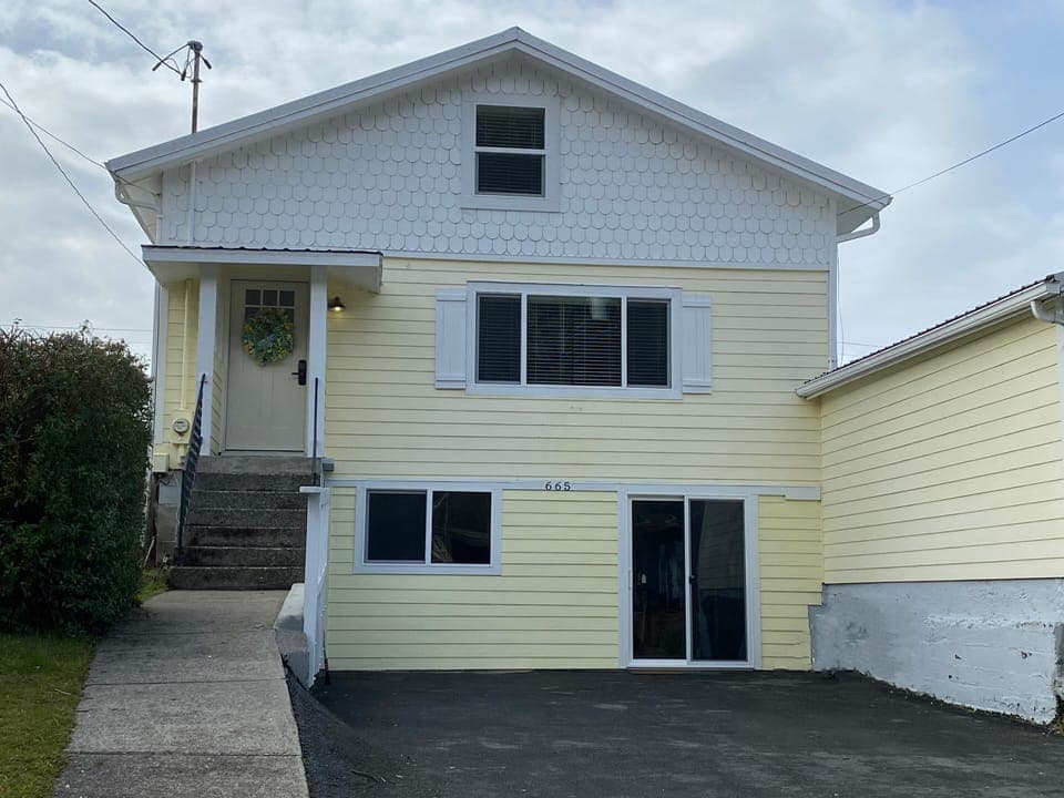 Welcome! We removed the garage and added open space and a place to gather.