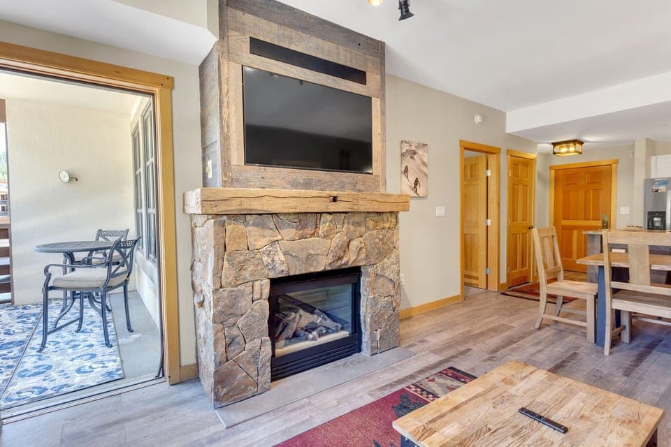 Fireplace with reclaimed barn wood and built-in TV