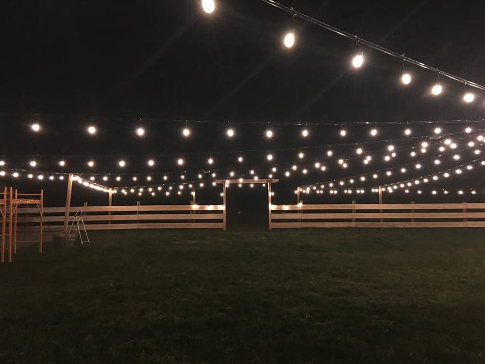 Canopy of lights over hillside view reception area