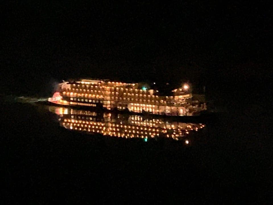 Paddlewheelers and towboats also light up the night!