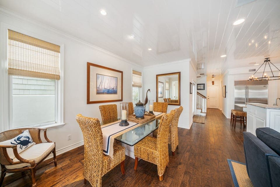 Dining room looking to Kitchen and stairs to upper floors.