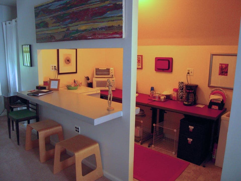 Kitchenette features a mini refrigerator, toaster oven, microwave, & coffeemaker