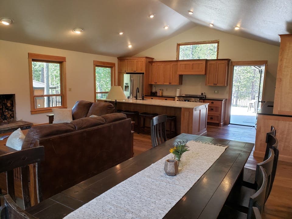 Dining table and kitchen.